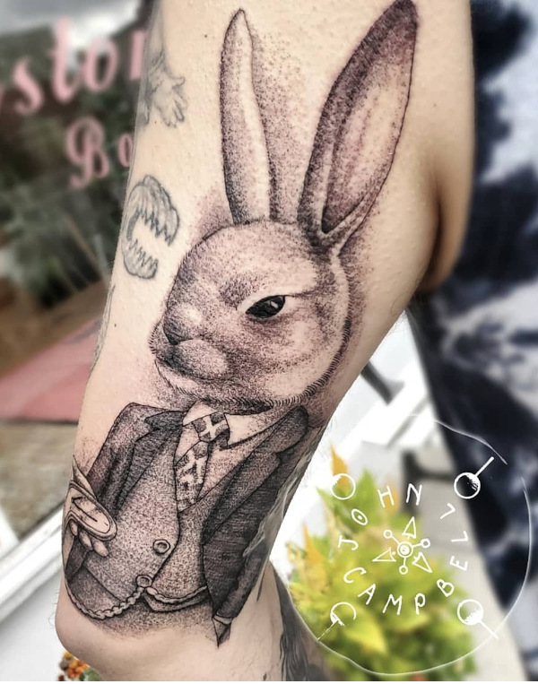 Alice in wonderland black and grey Late Rabbit tattoo by John Campbell at Sacred Mandala Studio tattoo parlor in Durham, NC.